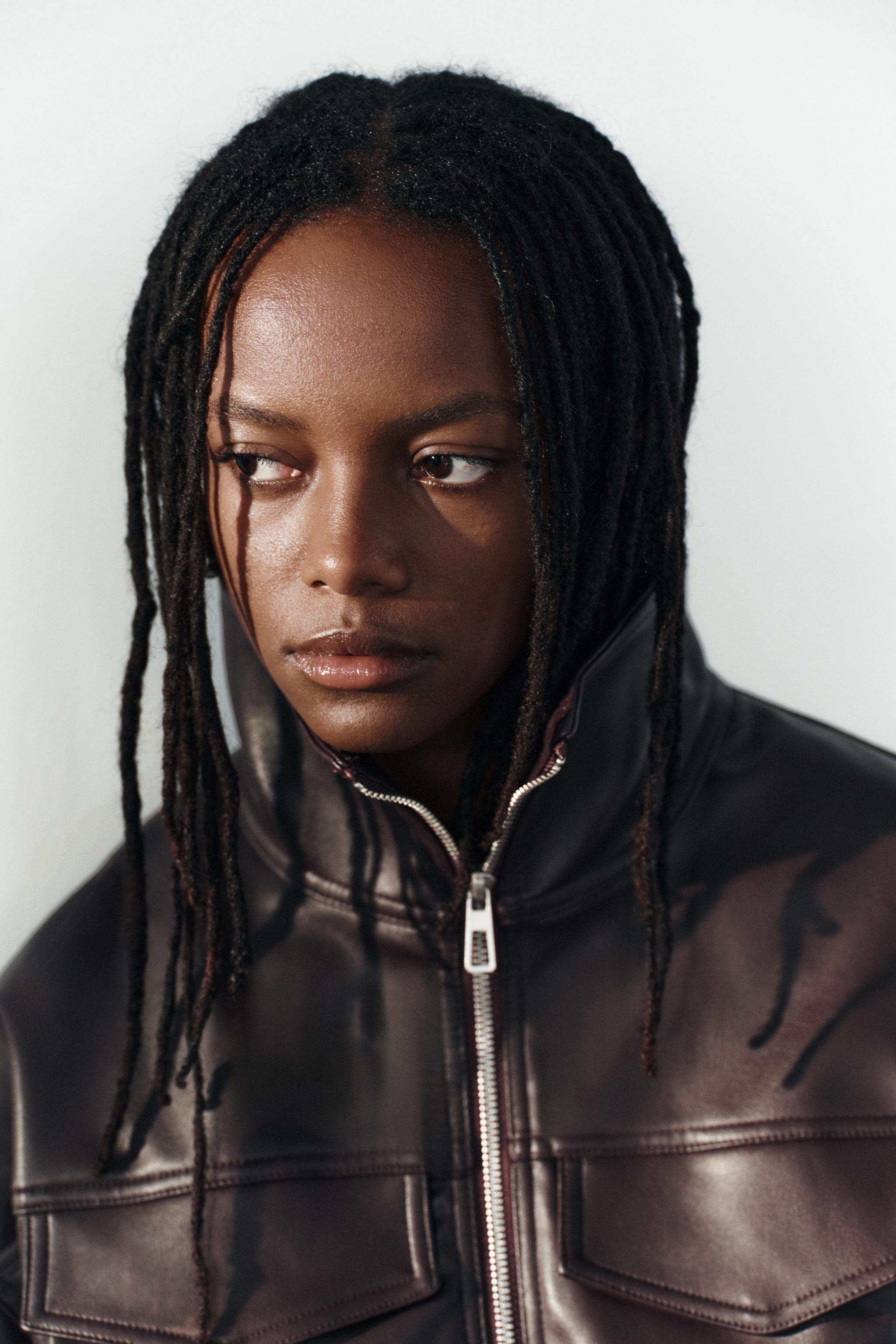 VESTE EN MATIÈRE SYNTHÉTIQUE À TAILLE AJUSTABLE